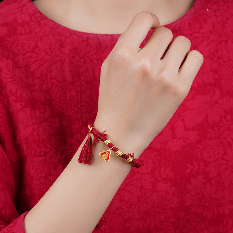 Bracelet tibétain en Buddha Stones avec pompon en forme de fleur et de déesse de la richesse Zakiram
