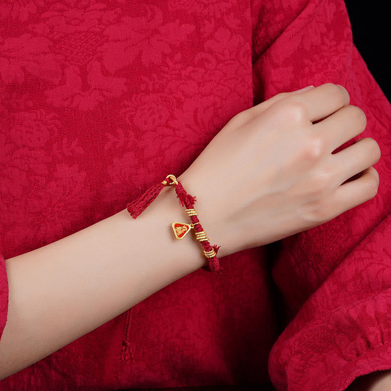 Bracelet tibétain en Buddha Stones avec pompon en forme de fleur et de déesse de la richesse Zakiram