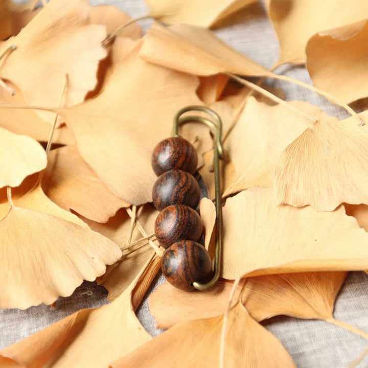 Buddha Stones Broche de guérison vintage en bois de santal, perles d'ébène, agathis alba, peltogyne