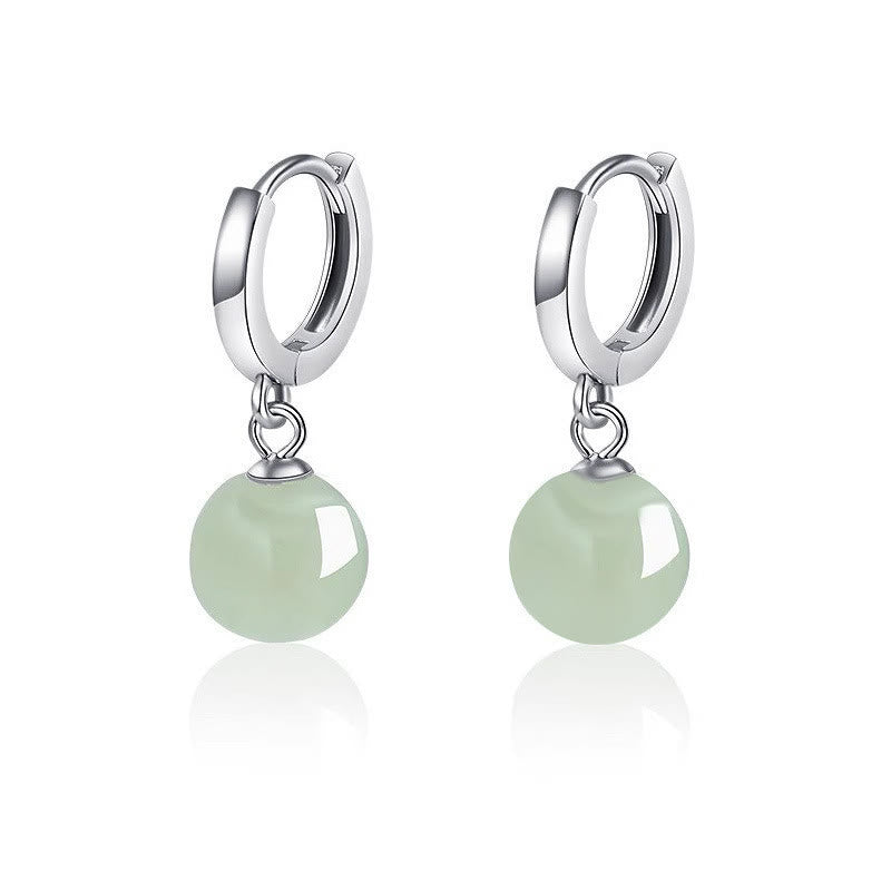 Boucles d'oreilles de prospérité en Buddha Stones