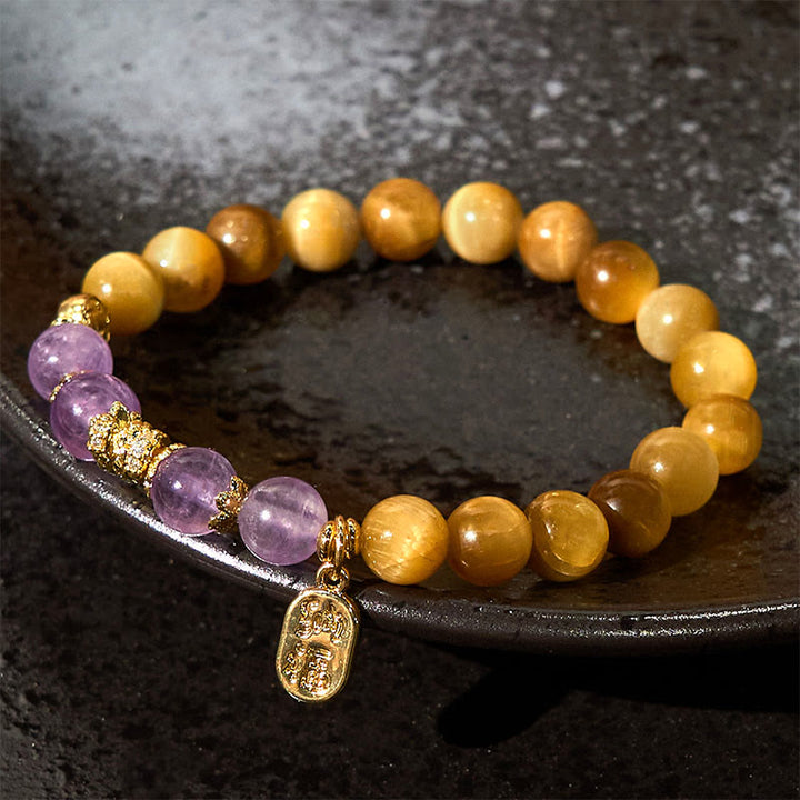 Bracelet de force de caractère Fu en Buddha Stones Année du serpent Oeil de tigre Améthyste