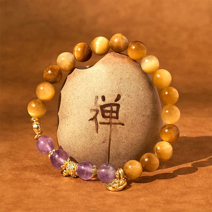 Bracelet de force de caractère Fu en Buddha Stones Année du serpent Oeil de tigre Améthyste