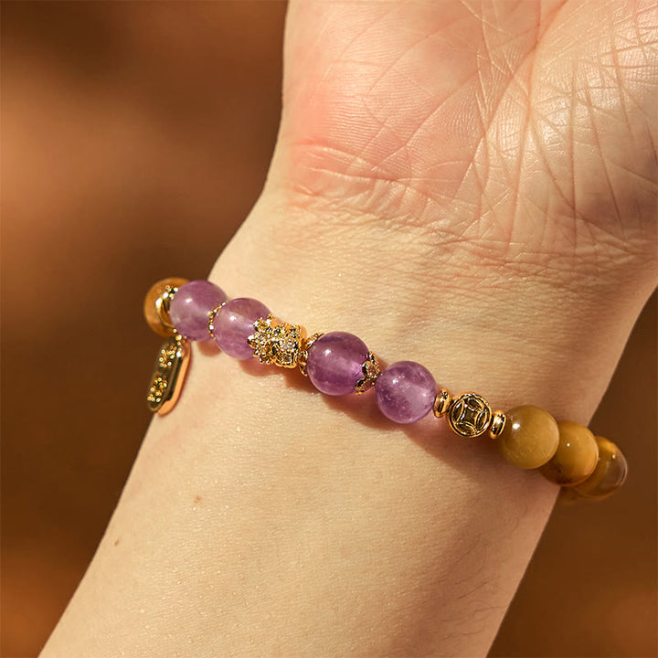 Bracelet de force de caractère Fu en Buddha Stones Année du serpent Oeil de tigre Améthyste