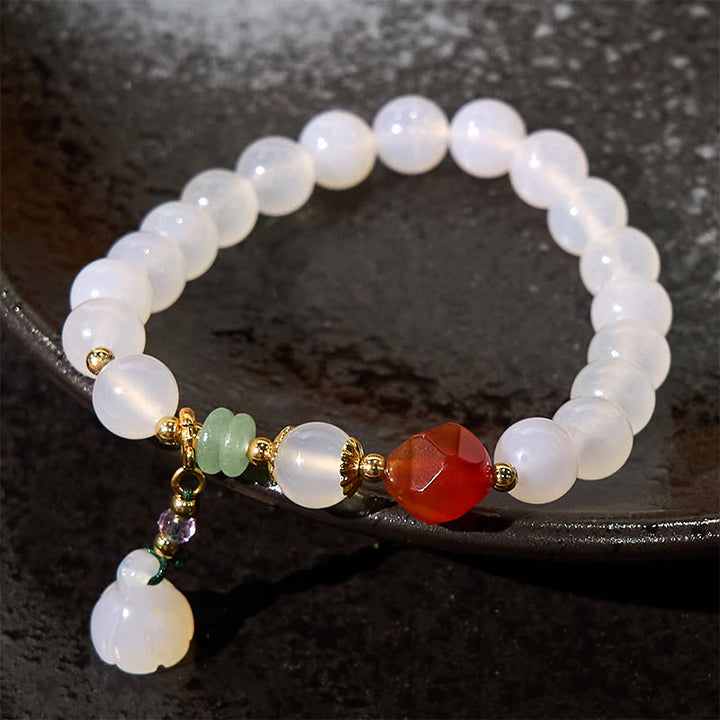 Bracelet porte-bonheur en agate blanche et agate rouge avec Buddha Stones