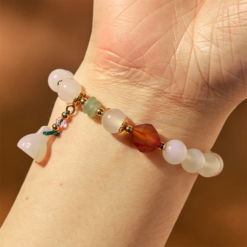 Bracelet porte-bonheur en agate blanche et agate rouge avec Buddha Stones