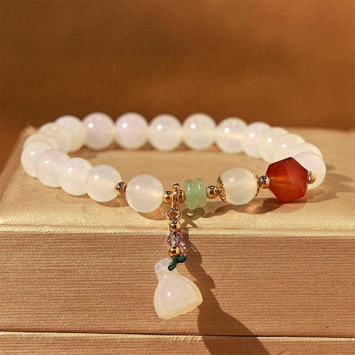 Bracelet porte-bonheur en agate blanche et agate rouge avec Buddha Stones