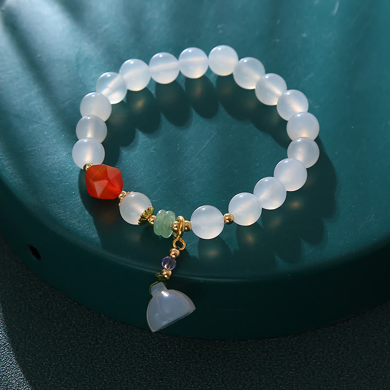 Bracelet porte-bonheur en agate blanche et agate rouge avec Buddha Stones