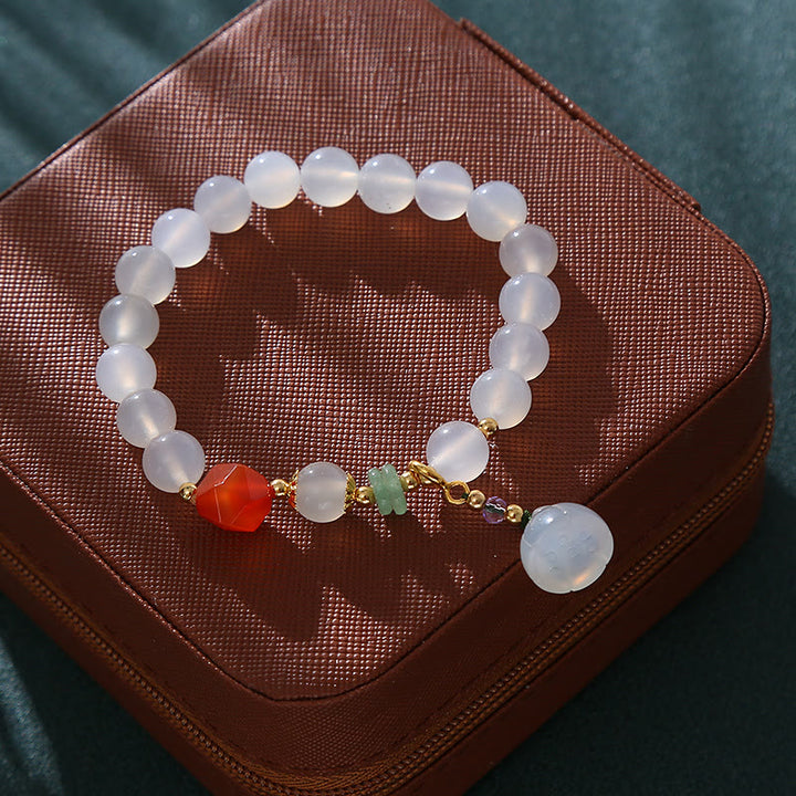 Bracelet porte-bonheur en agate blanche et agate rouge avec Buddha Stones