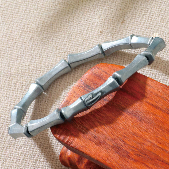 Bracelet de force en alliage à motif de bambou Buddha Stones