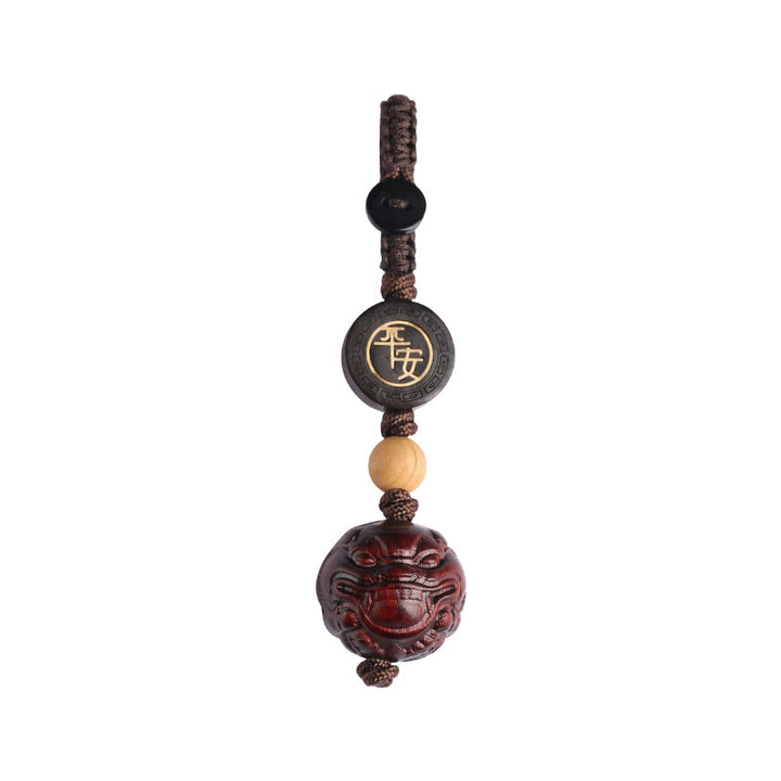 Porte-clés de protection sûr et efficace PiXiu en bois de santal rouge à petites feuilles de Buddha Stones