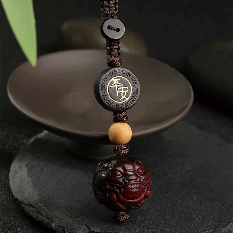 Porte-clés de protection sûr et efficace PiXiu en bois de santal rouge à petites feuilles de Buddha Stones
