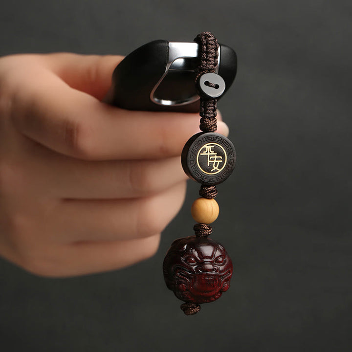 Porte-clés de protection sûr et efficace PiXiu en bois de santal rouge à petites feuilles de Buddha Stones