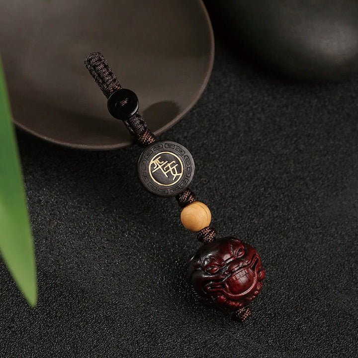 Porte-clés de protection sûr et efficace PiXiu en bois de santal rouge à petites feuilles de Buddha Stones