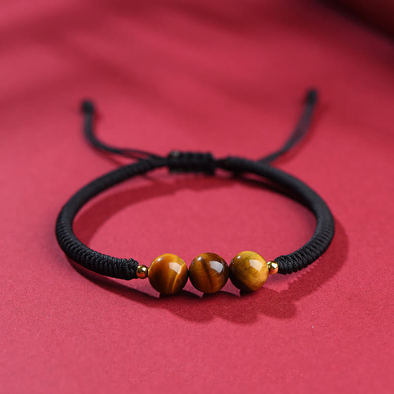 Bracelet en corde de protection porte-bonheur en perles d'œil de tigre faites à la main avec des Buddha Stones