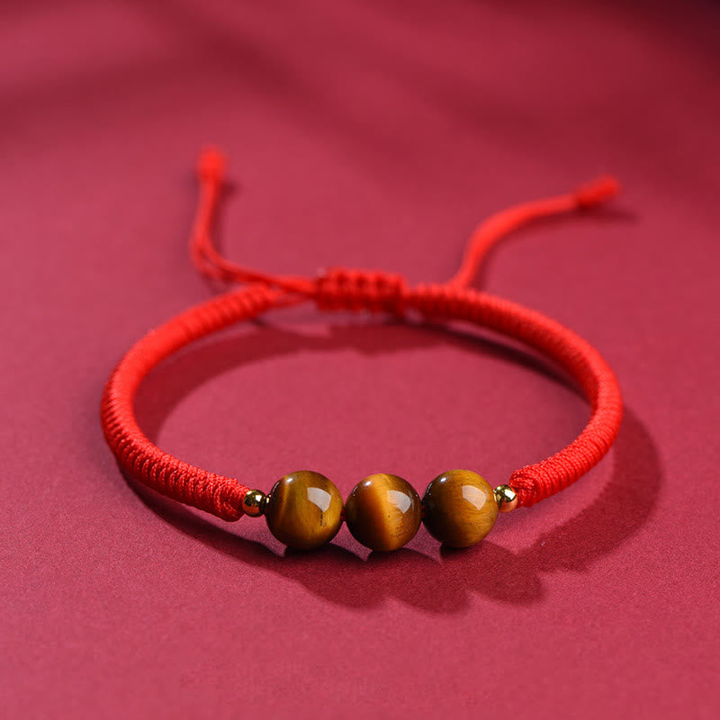 Bracelet en corde de protection porte-bonheur en perles d'œil de tigre faites à la main avec des Buddha Stones