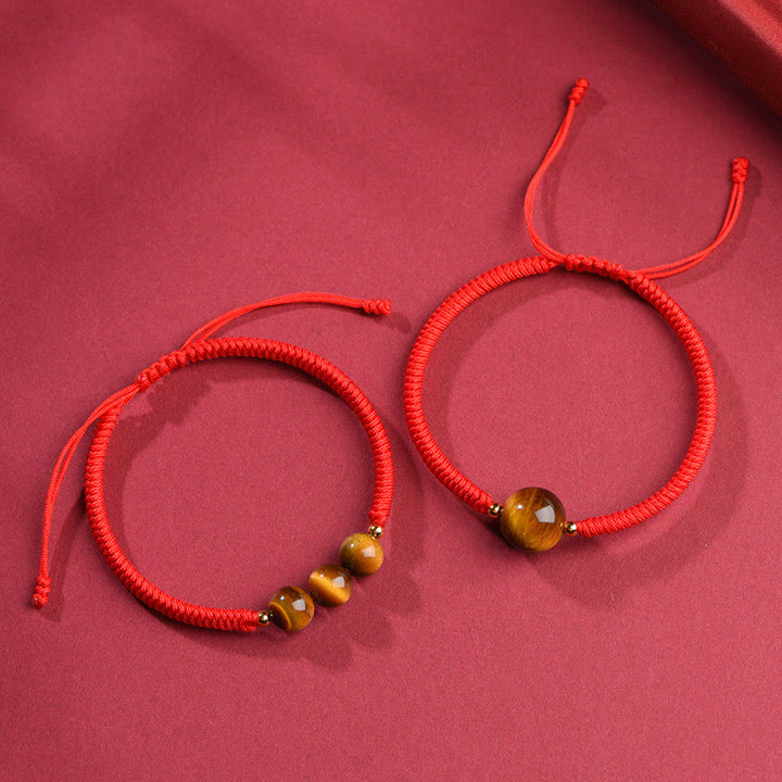 Bracelet en corde de protection porte-bonheur en perles d'œil de tigre faites à la main avec des Buddha Stones