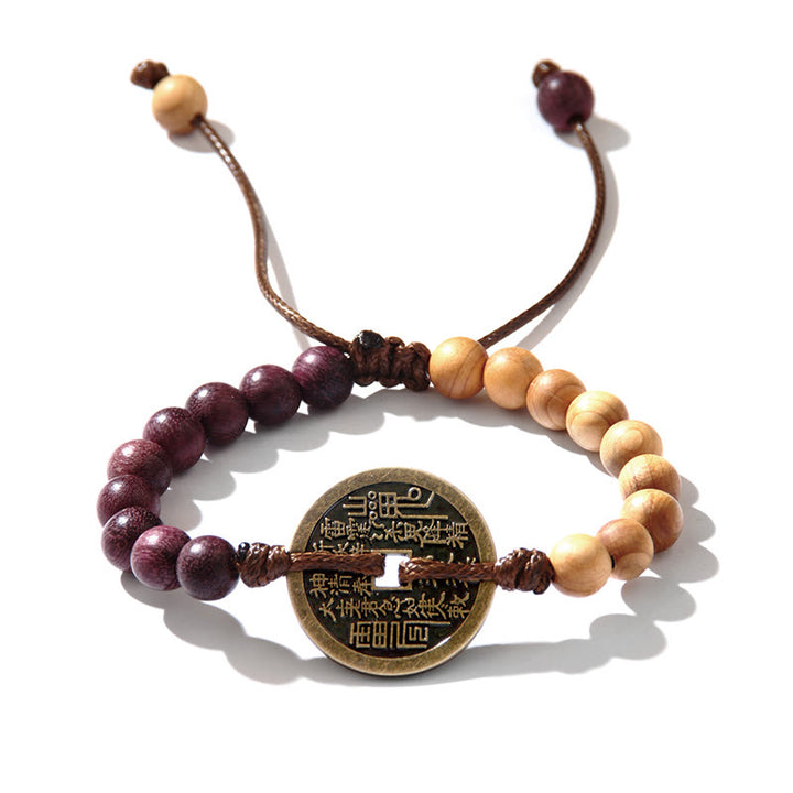 Buddha Stones d'ébène Bois de wengé Fantômes des montagnes Dépensez de l'argent Bagua Bracelet de paix en cuivre