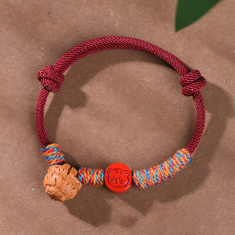 Bracelet porte-bonheur en cinabre et noyau de pêche en fil rouge fait main avec Buddha Stones et zodiaque chinois