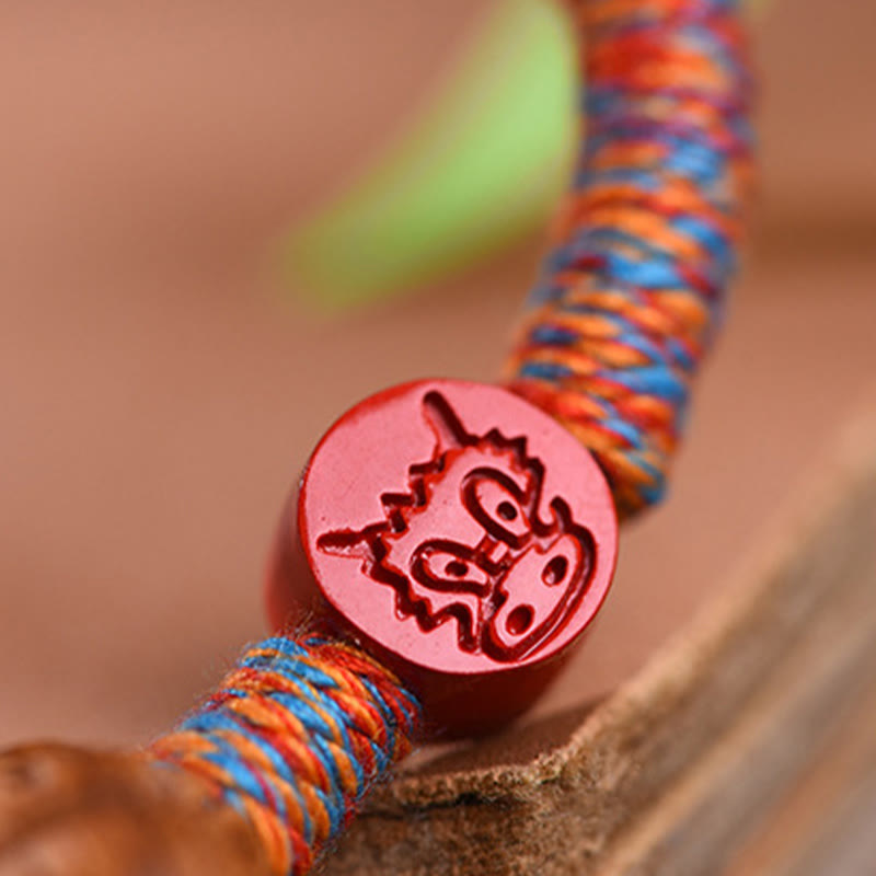 Bracelet porte-bonheur en cinabre et noyau de pêche en fil rouge fait main avec Buddha Stones et zodiaque chinois