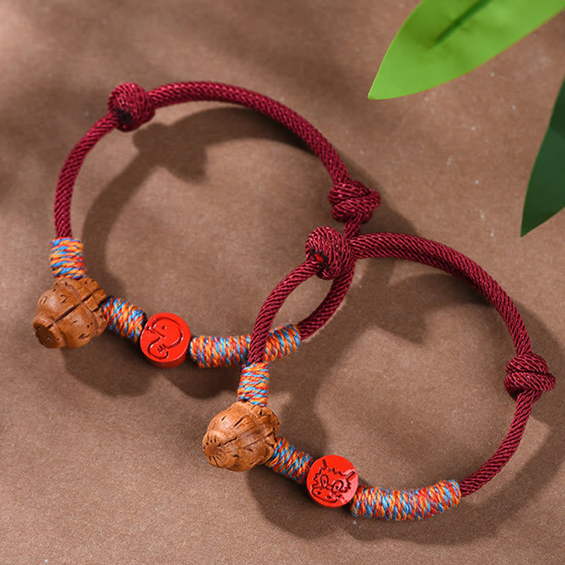 Bracelet porte-bonheur en cinabre et noyau de pêche en fil rouge fait main avec Buddha Stones et zodiaque chinois