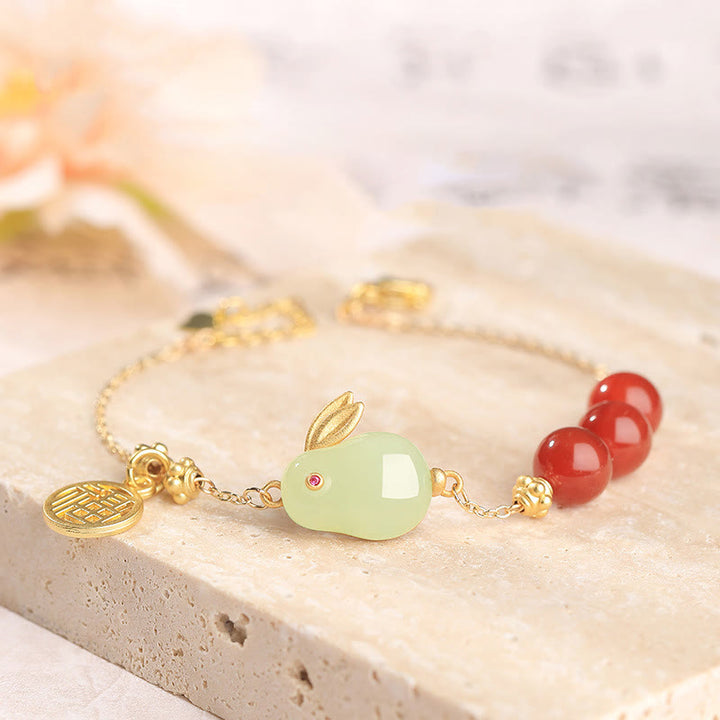 Bracelet en chaîne avec boucle porte-bonheur en Buddha Stones d'agate rouge et jade Hetian avec personnage Fu et lapin
