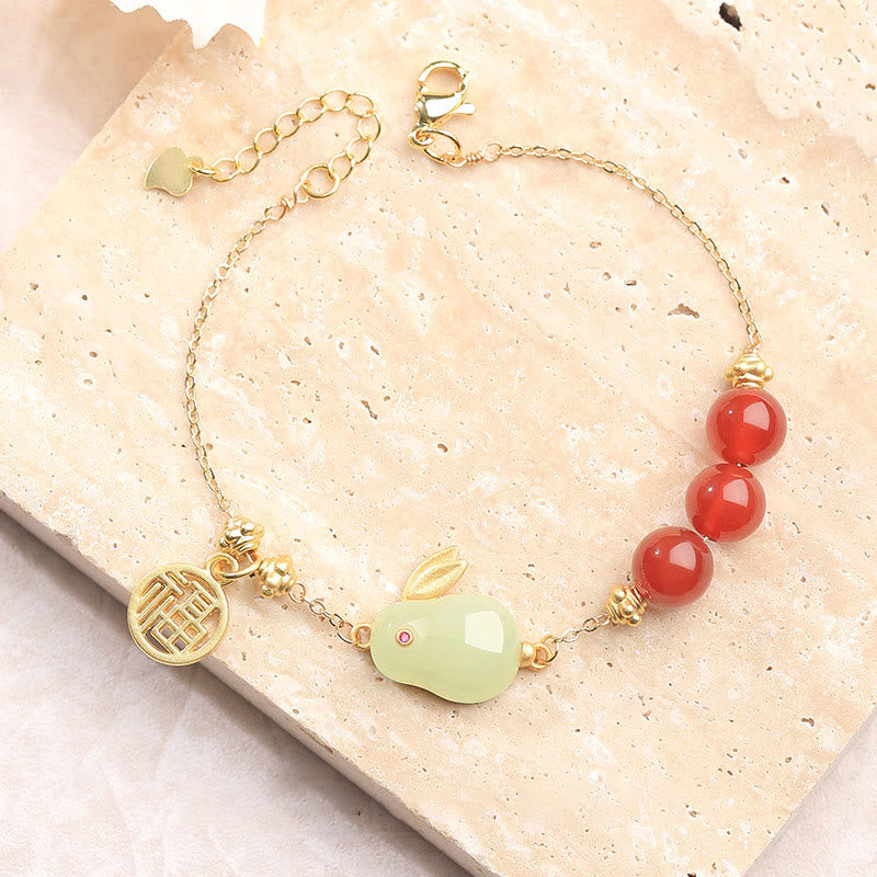 Bracelet en chaîne avec boucle porte-bonheur en Buddha Stones d'agate rouge et jade Hetian avec personnage Fu et lapin