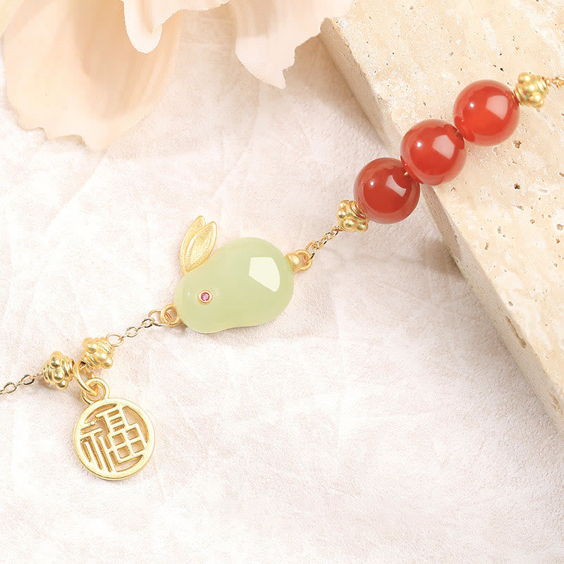 Bracelet en chaîne avec boucle porte-bonheur en Buddha Stones d'agate rouge et jade Hetian avec personnage Fu et lapin