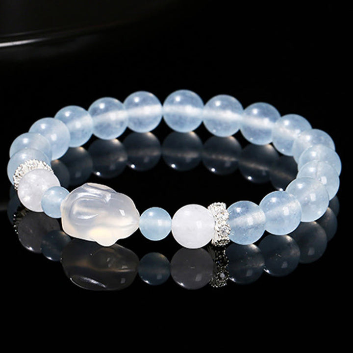 Bracelet d'équilibre émotionnel en Buddha Stones, calcédoine bleue, agate blanche et lapin