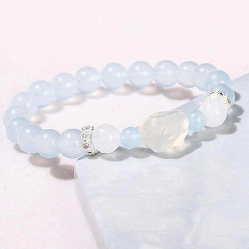 Bracelet d'équilibre émotionnel en Buddha Stones, calcédoine bleue, agate blanche et lapin