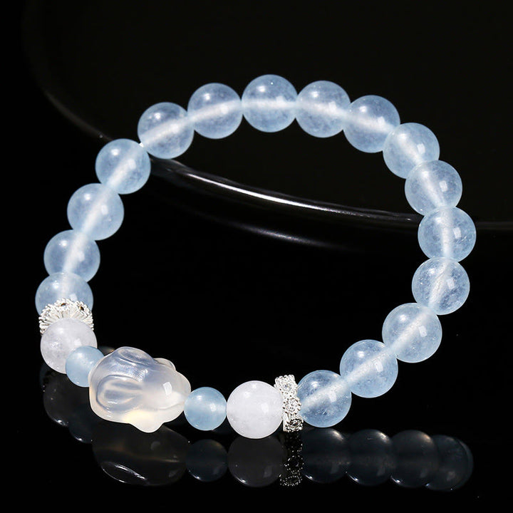 Bracelet d'équilibre émotionnel en Buddha Stones, calcédoine bleue, agate blanche et lapin