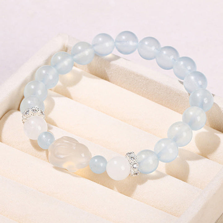Bracelet d'équilibre émotionnel en Buddha Stones, calcédoine bleue, agate blanche et lapin