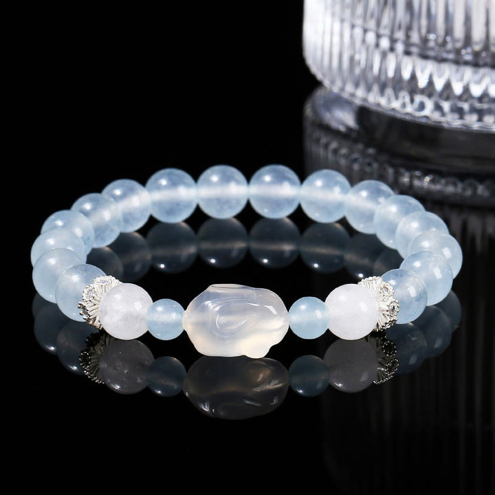 Bracelet d'équilibre émotionnel en Buddha Stones, calcédoine bleue, agate blanche et lapin
