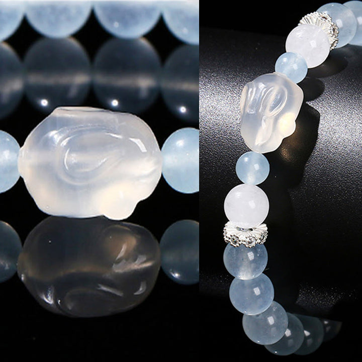 Bracelet d'équilibre émotionnel en Buddha Stones, calcédoine bleue, agate blanche et lapin