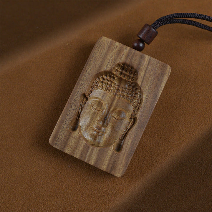 Collier pendentif symbole positif Buddha Stones en bois de santal vert
