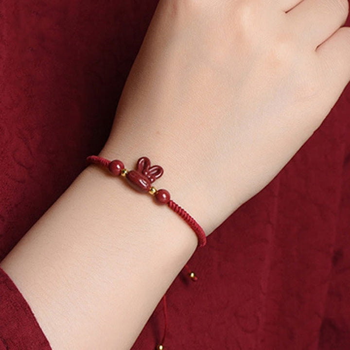 Bracelet en corde rouge fait main en Buddha Stones avec signe du zodiaque chinois et lapin porte-bonheur