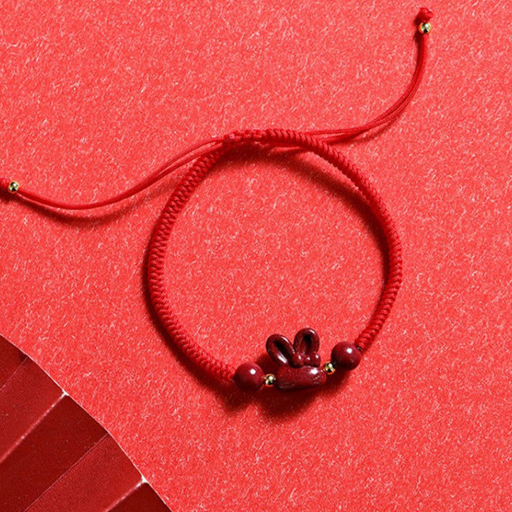 Bracelet en corde rouge fait main en Buddha Stones avec signe du zodiaque chinois et lapin porte-bonheur
