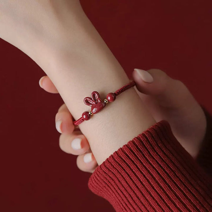 Bracelet en corde rouge fait main en Buddha Stones avec signe du zodiaque chinois et lapin porte-bonheur