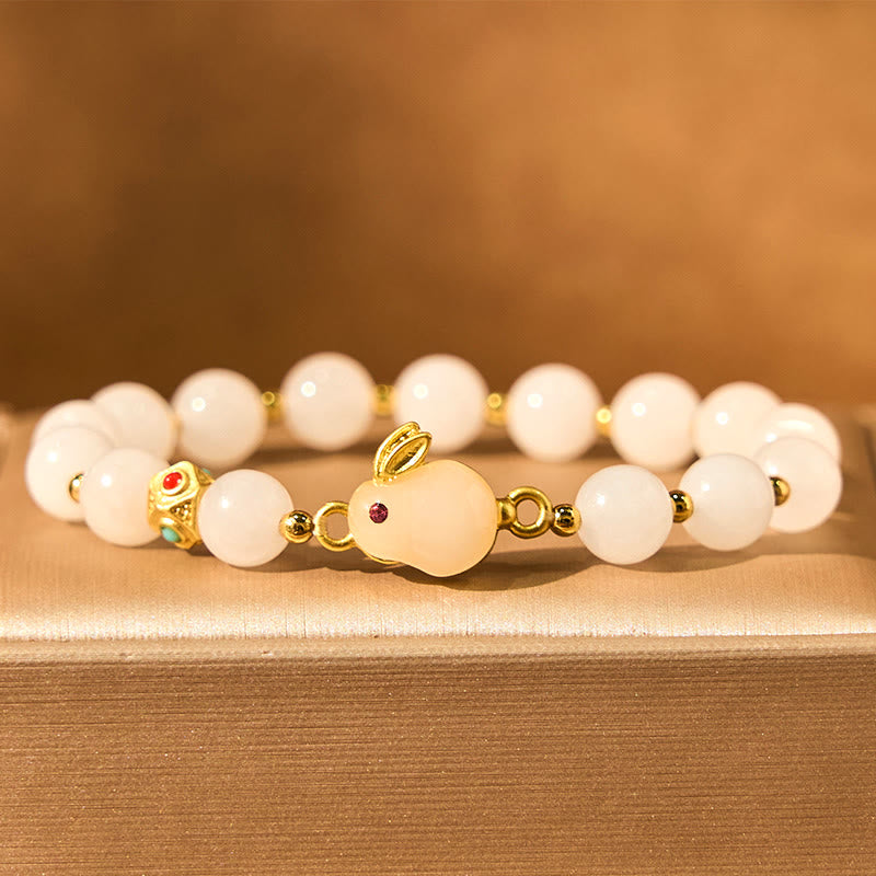 Bracelet porte-bonheur en jade et soie dorée avec Buddha Stones et lapin mignon