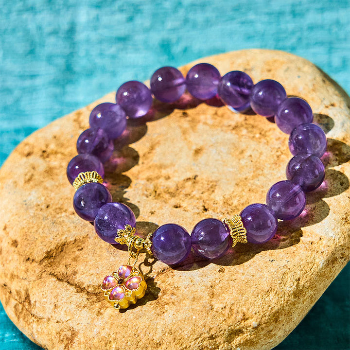 Bracelet de communication avec breloque en améthyste naturelle et trèfle à quatre feuilles de Buddha Stones