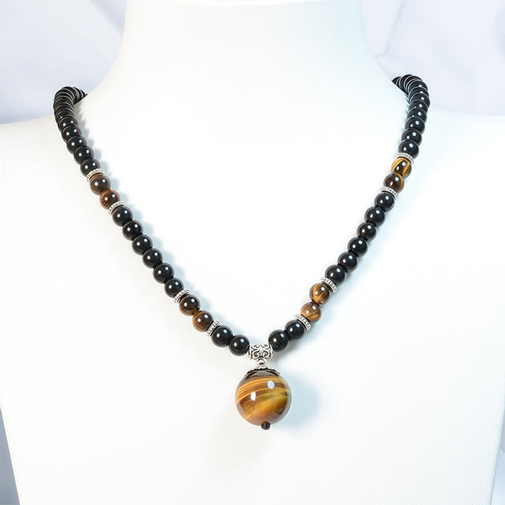Collier pendentif renforcé en obsidienne noire et œil de tigre avec Buddha Stones
