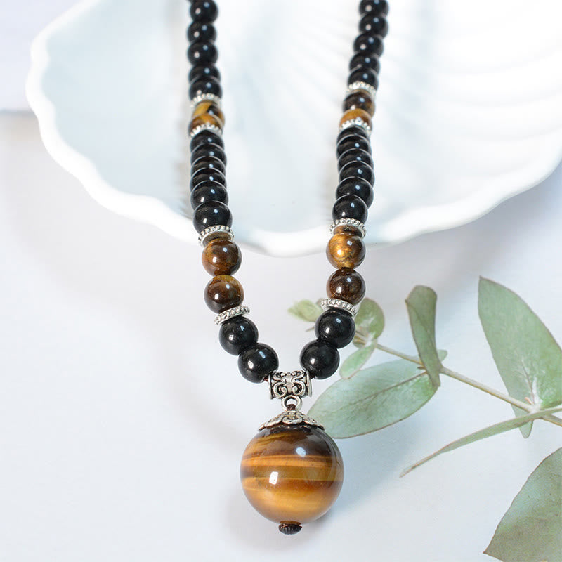 Collier pendentif renforcé en obsidienne noire et œil de tigre avec Buddha Stones