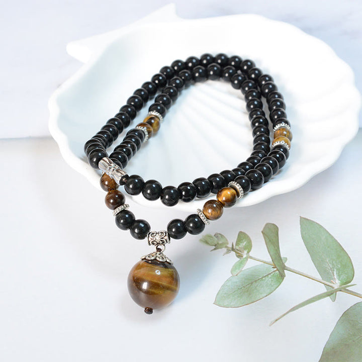 Collier pendentif renforcé en obsidienne noire et œil de tigre avec Buddha Stones - Œil de tigre en obsidienne noire - image 0