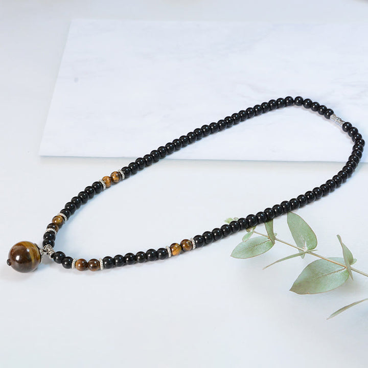 Collier pendentif renforcé en obsidienne noire et œil de tigre avec Buddha Stones
