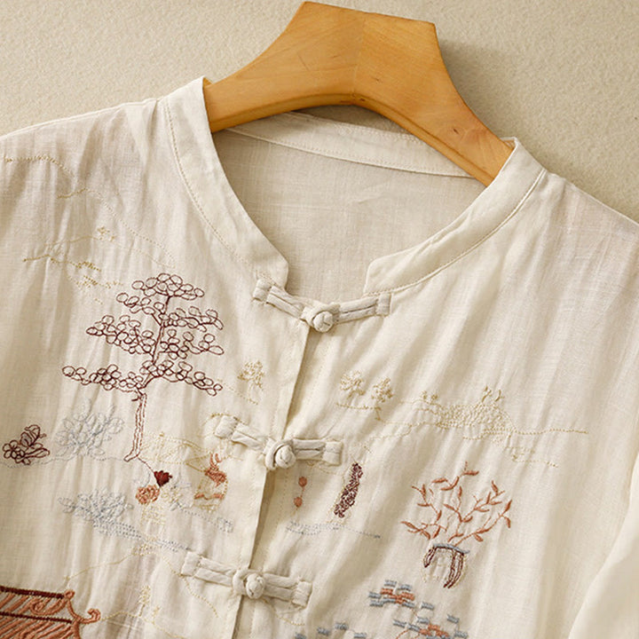 Chemise décontractée en coton à manches trois-quarts et col ras du cou avec broderies de plantes et boutons en forme de grenouille pour femmes Buddha Stones