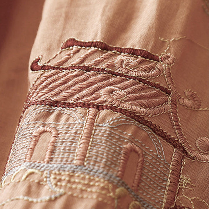 Chemise décontractée en coton à manches trois-quarts et col ras du cou avec broderies de plantes et boutons en forme de grenouille pour femmes Buddha Stones