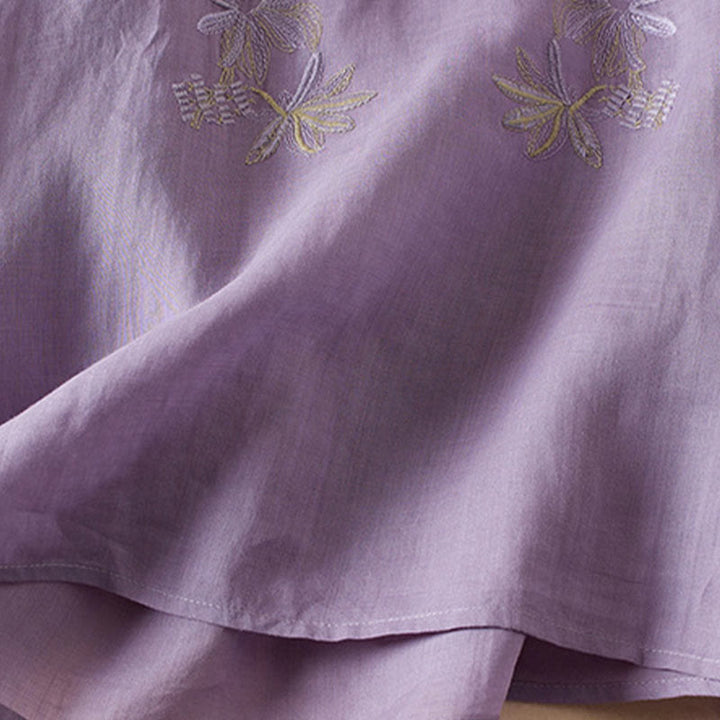 Chemise décontractée à manches courtes et col en V pour femme avec broderies de Buddha Stones et plantes