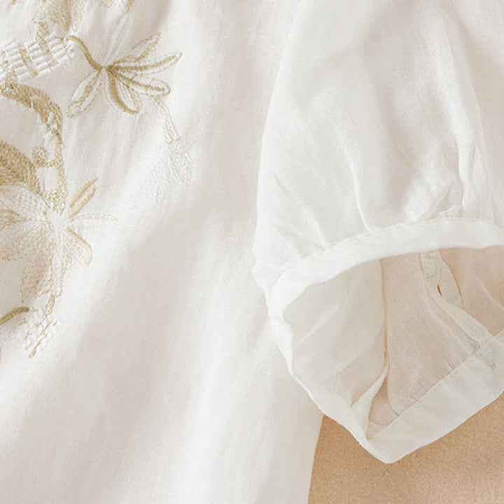 Chemise décontractée à manches courtes et col en V pour femme avec broderies de Buddha Stones et plantes