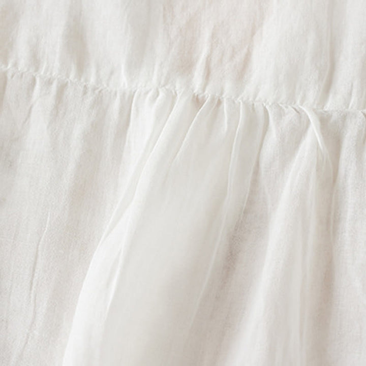 Chemise décontractée à manches courtes et col en V pour femme avec broderies de Buddha Stones et plantes