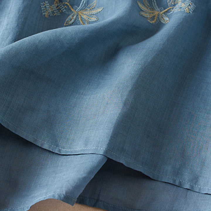 Chemise décontractée à manches courtes et col en V pour femme avec broderies de Buddha Stones et plantes