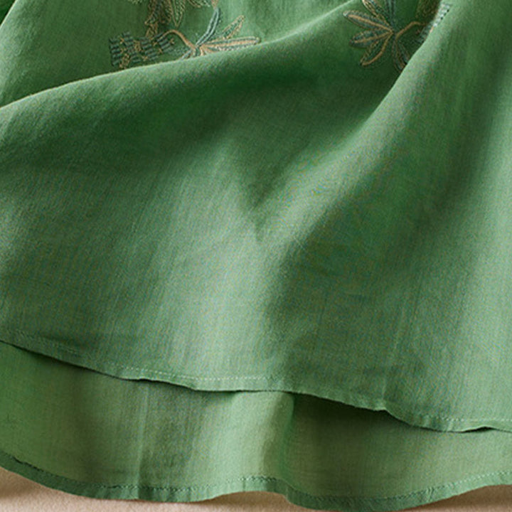 Chemise décontractée à manches courtes et col en V pour femme avec broderies de Buddha Stones et plantes